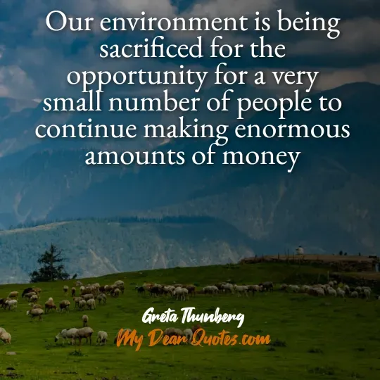 A quote from Greta Thunberg against a background of a green hillside with a flock of sheep grazing, and mountains in the distance under a blue sky. The quote reads: "Our environment is being sacrificed for the opportunity for a very small number of people to continue making enormous amounts of money." Below the quote, it says "Greta Thunberg" and "My Dear Quotes.com".