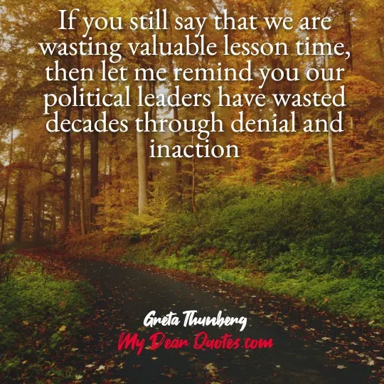 A quote from Greta Thunberg against a background of a path winding through a forest with trees displaying autumn colors of orange, yellow, and green. The quote reads: "If you still say that we are wasting valuable lesson time, then let me remind you our political leaders have wasted decades through denial and inaction." Below the quote, it says "Greta Thunberg" and "My Dear Quotes.com".