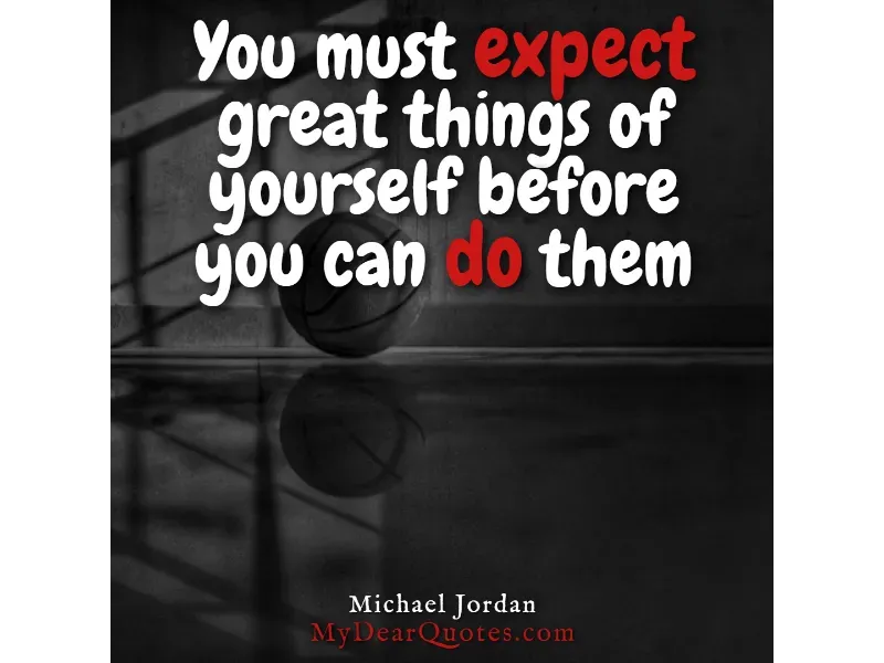 A basketball on a reflective dark surface, with a quote by Michael Jordan: "You must expect great things of yourself before you can do them."