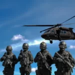 Soldiers looking at a helicopter, symbolizing honor, service, and the dedication celebrated on Law Enforcement Appreciation Day.