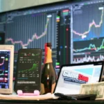 Multiple computer screens displaying stock market charts with upward trends, a smartphone showing stock prices, and a laptop with the GameStop logo, symbolizing market speculation and technological impact on investments.