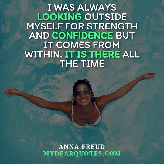 An overhead view of a smiling woman with dark hair and sunglasses floating on her back in clear, blue-green water, with her arms outstretched to the sides. Overlaying the image is the quote "I WAS ALWAYS LOOKING OUTSIDE MYSELF FOR STRENGTH AND CONFIDENCE BUT IT COMES FROM WITHIN. IT IS THERE ALL THE TIME." The words "LOOKING," "CONFIDENCE," and "IT IS THERE" are highlighted in green. The quote is attributed to Anna Freud, with "MYDEARQUOTES.COM" visible below.