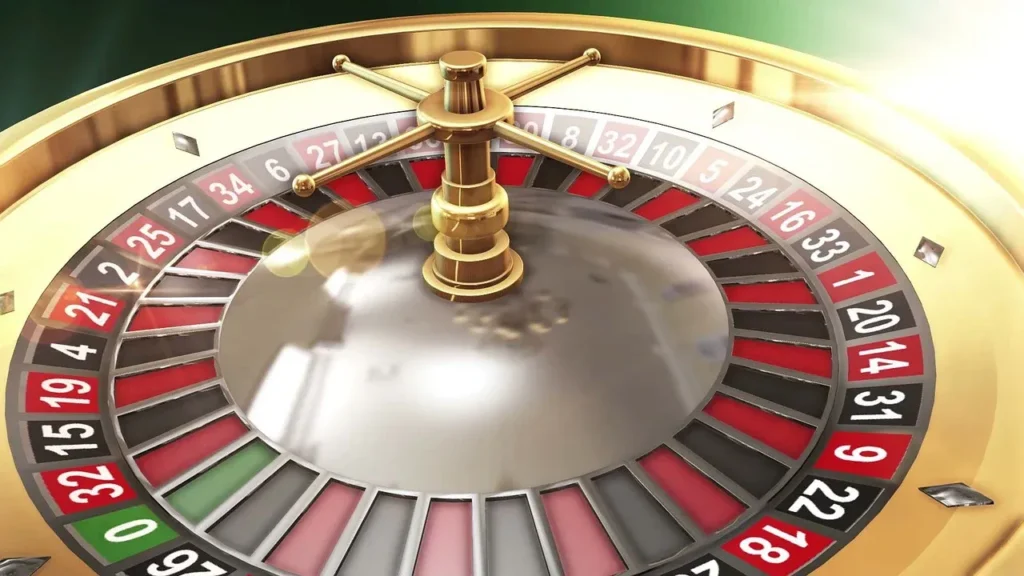 A detailed, close-up shot of a golden roulette wheel with the numbers in red and black, representing the game of chance in an online casino.