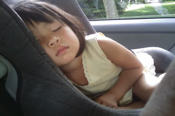 Why Pediatricians Warn Against Letting Kids Ride Up Front