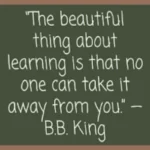 A quote attributed to B.B. King written on a dark green chalkboard in white chalk-style font, which reads: "The beautiful thing about learning is that no one can take it away from you."