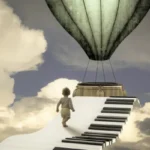A surreal, artistic image of a young child walking up a path made of large piano keys that ascends toward the basket of a vintage hot air balloon floating among dramatic clouds.