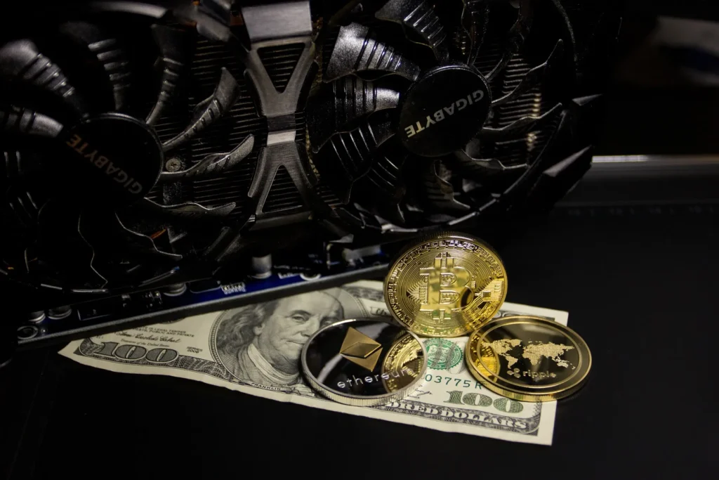 A high-quality 3D render of various alternative cryptocurrency coins including Kaspa, Ravencoin, and Monero, representing low-cost and high-profit mining options.